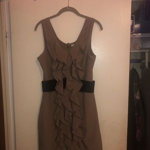 Above the knee, large, stretchy material dress.